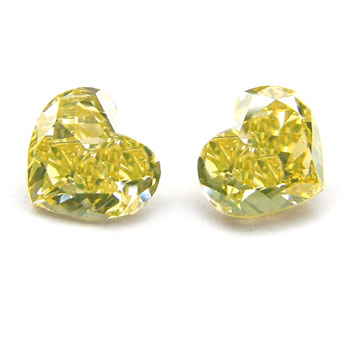View 1.28 ct. Heart Shape Fancy br. Yellow (pair)