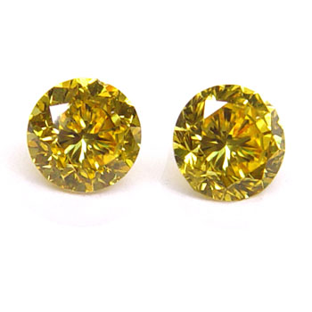 View 0.81 ct. Round Fancy Vivid o. Yellow (Pair)