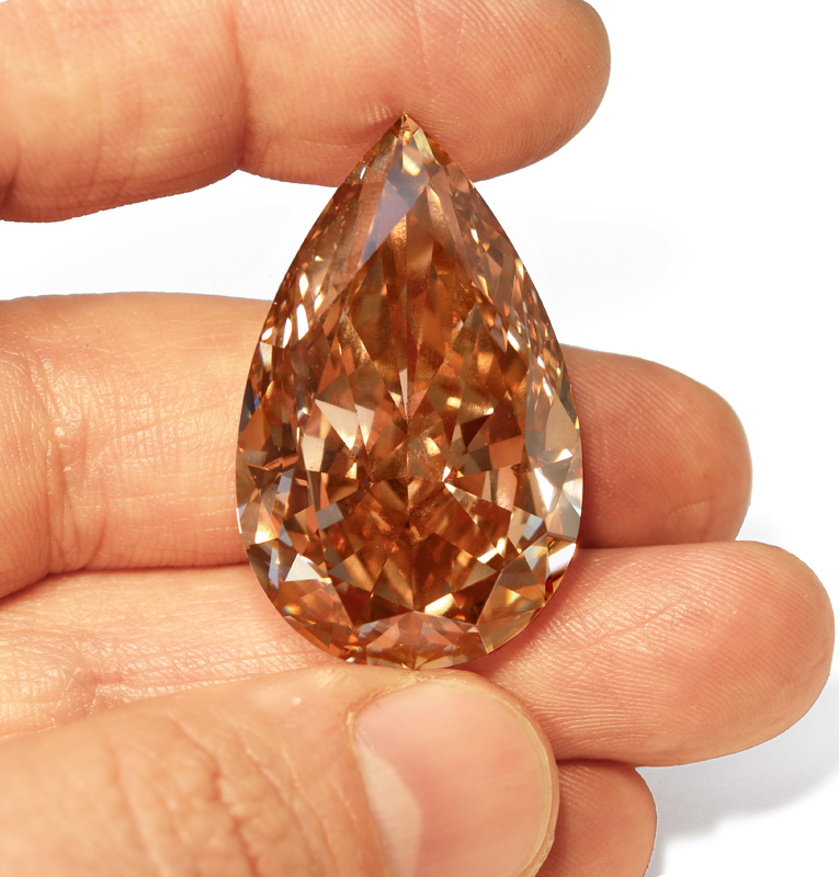 View 81.08 ct. Pear Shape Fancy Brown Orange